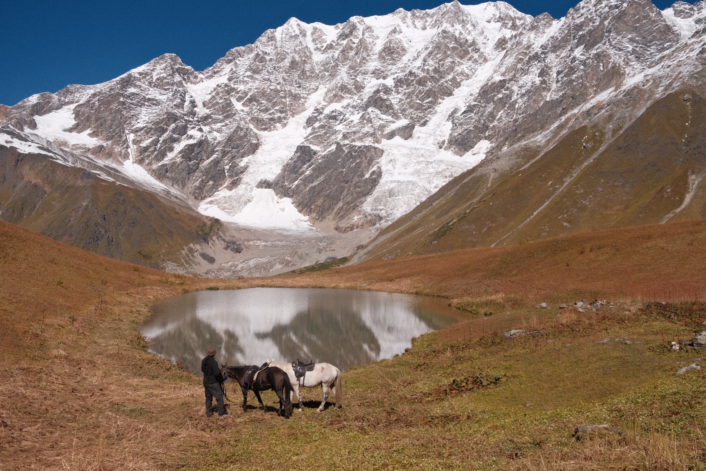 Riders on the Ushguli valley track