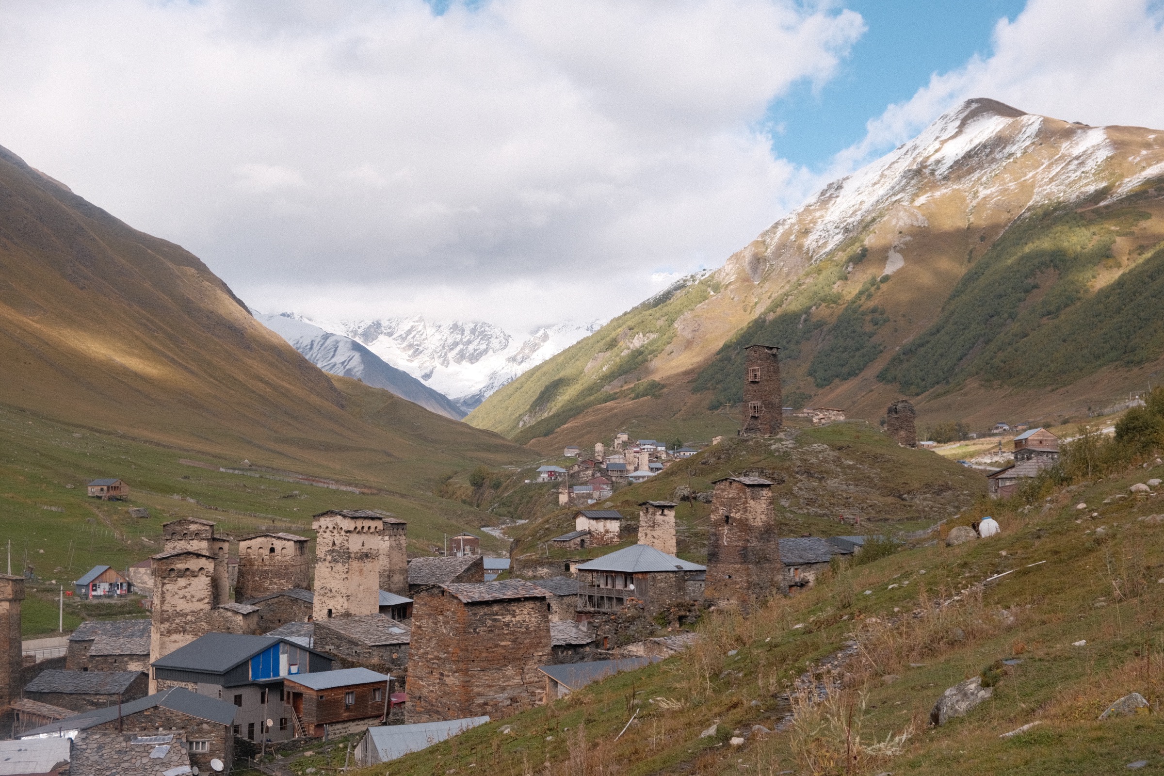 Riders climbing towards the pass